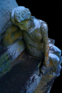 "Solitary Sorrow" photo of a statue