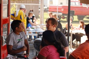 People sharing testimonies and becoming acquainted at Sojourn Church's August 2011 Health Clinic.