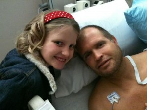 Mia, reunited with her daddy Darrell after she was released from hospital care