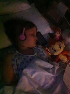 Mia Gilles, sleeping in hospital bed. She and Caleb have been able to share a room