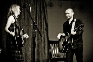 Sandra McCracken and Derek Webb performing at Sojourn's The 930 Art Center.